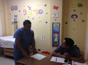 Dr. Toc and Dr. Pedro (Pediatrician) discussing a patient