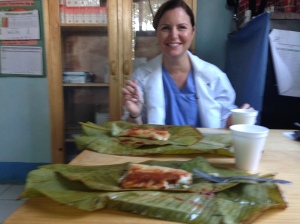 Me and Dr. Lebo resting in between patients with a snack of tamales